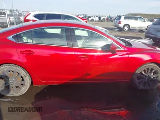 2016 Mazda 6 i Grand Touring with VIN JM1GJ1W57G1438524, listed as a IAAI auction lot 41365211 with 162,678 mi miles and . Bid and sale history available at DreamBid. Image 14.