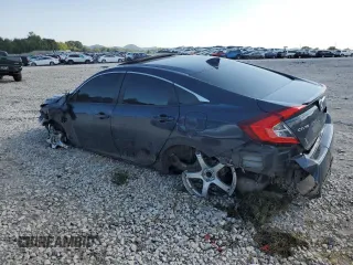 2020 Honda Civic Sedan EX-L with VIN 19XFC1F7XLE021851, listed as a Copart auction lot 68318734 with 74,519 mi miles and Salvage Title. Bid and sale history available at carsss.com. Image 2.