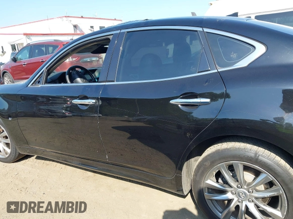 2015 Infiniti Q70 с VIN JN1BY1AR2FM560837, выставлен на аукционе IAAI как лот 42577382 с пробегом 145 507 миль миль и . История ставок и продаж доступна на DreamBid. Изображение 14.