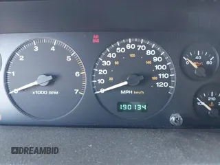 1999 Jeep Grand Cherokee Laredo with VIN 1J4GW58NXXC623753, listed as a IAAI auction lot 41685540 with 190,134 mi miles and . Bid and sale history available at DreamBid. Image 7.