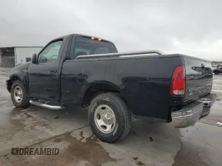 2000 Ford F-150 XL with VIN 3FTZF1728YMA63732, listed as a Copart auction lot 80010344 with Not provided miles and Salvage title. Bid and sale history available at DreamBid. Image 2.