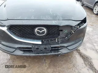 2018 Mazda CX-5 Touring with VIN JM3KFBCMXJ0450040, listed as a IAAI auction lot 41650824 with 83,133 mi miles. Bid and sale history available at carsss.com. Image 12.