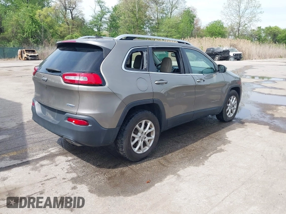 2016 Jeep Cherokee Latitude with VIN 1C4PJMCS6GW242153, listed as a IAAI auction lot 42107782 with 90,562 mi miles and . Bid and sale history available at carsss.com. Image 4.