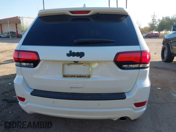 2020 Jeep Grand Cherokee Altitude with VIN 1C4RJEAG1LC251934, listed as a IAAI auction lot 41480299 with 74,169 mi miles and . Bid and sale history available at DreamBid. Image 16.