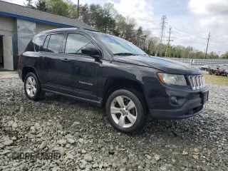 2014 Jeep Compass Latitude with VIN 1C4NJDEB6ED623613, listed as a Copart auction lot 52078795 with 186,156 mi miles and Clean Title. Bid and sale history available at carsss.com. Image 4.