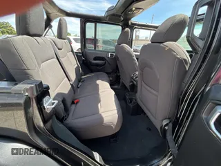 2023 Jeep Wrangler Sport S with VIN 1C4HJXDG2PW615754, listed as a Copart auction lot 53884255 with 34,427 mi miles and Clean Title. Bid and sale history available at DreamBid. Image 6.
