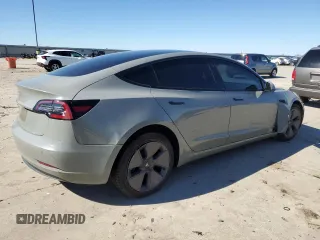 2022 Tesla Model 3 z VIN 5YJ3E1EA5NF124425, wystawiony jako Copart lot #43804405 z przebiegiem 57 412 mil mil oraz Szkoda całkowita • Salvage title. Historia ofert i sprzedaży dostępna na DreamBid. Obrazek 3.
