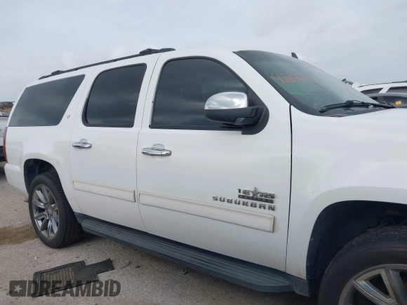 2011 Chevrolet Suburban LT with VIN 1GNSCJE05BR392834, listed as a IAAI auction lot 42141087 with 251,359 mi miles and . Bid and sale history available at DreamBid. Image 13.