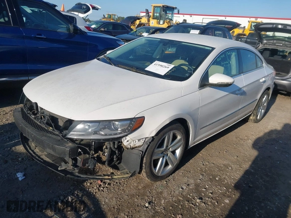2014 Volkswagen CC R-Line with VIN WVWBP7AN0EE504680, listed as a IAAI auction lot 41990269 with 137,660 mi miles. Bid and sale history available at carsss.com. Image 2.