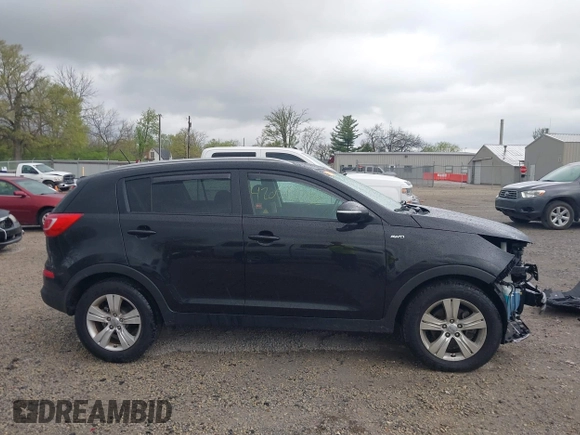 2012 Kia Sportage LX with VIN KNDPBCA27C7206731, listed as a IAAI auction lot 42056238 with 67,926 mi miles and . Bid and sale history available at DreamBid. Image 14.