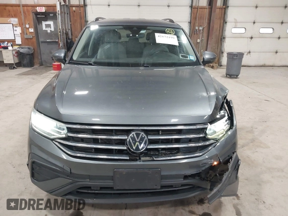 2022 Volkswagen Tiguan S z VIN 3VV0B7AX2NM042934, wystawiony jako IAAI lot #42172199 z przebiegiem 71 367 mil mil oraz . Historia ofert i sprzedaży dostępna na DreamBid. Obrazek 12.
