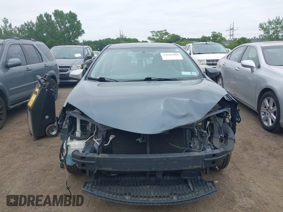 2014 Toyota Corolla L with VIN 2T1BURHE5EC027497, listed as a IAAI auction lot 42602880 with 101,094 mi miles and . Bid and sale history available at DreamBid. Image 12.