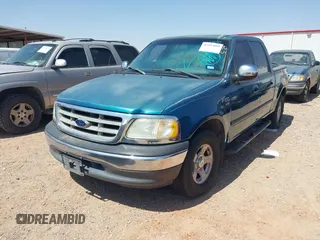 2001 Ford F-150 XLT with VIN 1FTRW07W01KA75819, listed as a IAAI auction lot 42293859 with 156,137 mi miles and . Bid and sale history available at DreamBid. Image 2.