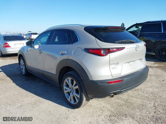 2023 Mazda CX-30 2.5 S Premium Package with VIN 3MVDMBDM5PM525771, listed as a IAAI auction lot 41476431 with 39,326 mi miles. Bid and sale history available at carsss.com. Image 3.