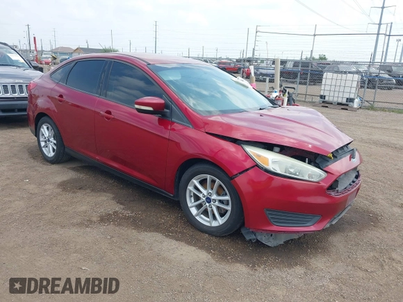 2015 Ford Focus SE with VIN 1FADP3F24FL323536, listed as a IAAI auction lot 41876148 with 221,050 mi miles. Bid and sale history available at carsss.com. Image 1.