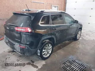 2014 Jeep Cherokee Limited z VIN 1C4PJMDS0EW240958, wystawiony jako IAAI lot #41541340 z przebiegiem 140 625 mil mil oraz . Historia ofert i sprzedaży dostępna na DreamBid. Obrazek 4.