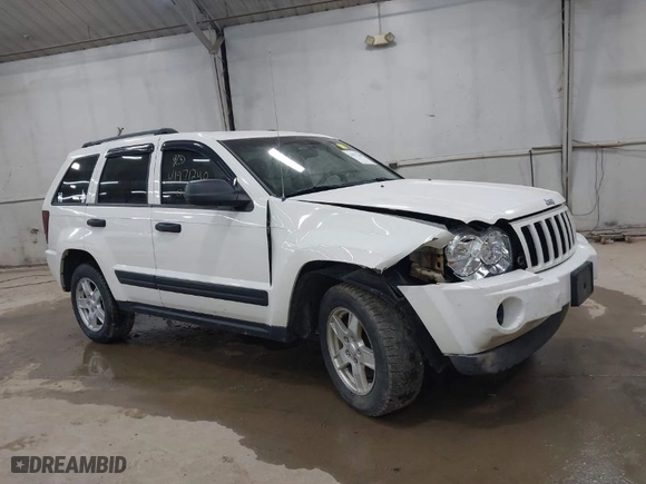 2006 Jeep Grand Cherokee Laredo with VIN 1J8GR48K06C163877, listed as a IAAI auction lot 41971240 with 250,544 mi miles. Bid and sale history available at carsss.com. Image 1.