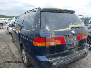 2004 Honda Odyssey EX-RES z VIN 5FNRL18874B132825, wystawiony jako IAAI lot #41978812 z przebiegiem 147 792 mil mil oraz . Historia ofert i sprzedaży dostępna na DreamBid. Obrazek 16.