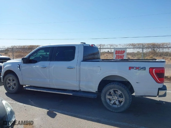 2021 Ford F-150 XL with VIN 1FTFW1E86MFC72651, listed as a IAAI auction lot 41840341 with 100,645 mi miles. Bid and sale history available at carsss.com. Image 14.