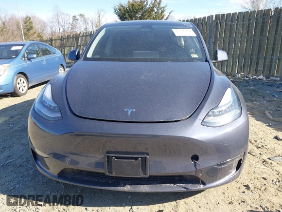 2023 Tesla Model Y Long Range with VIN 7SAYGDEE4PA145922, listed as a IAAI auction lot 41771974 with 22,670 mi miles. Bid and sale history available at carsss.com. Image 12.