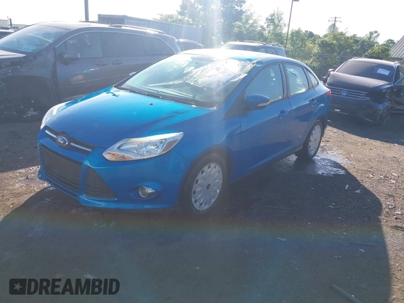 2012 Ford Focus SE with VIN 1FAHP3F2XCL327992, listed as a IAAI auction lot 42305746 with 65,229 mi miles and . Bid and sale history available at DreamBid. Image 2.