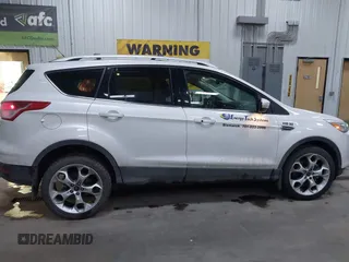 2016 Ford Escape Titanium with VIN 1FMCU9J94GUC79910, listed as a IAAI auction lot 41644467 with 43,261 mi miles. Bid and sale history available at carsss.com. Image 13.