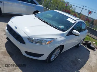 2016 Ford Focus SE with VIN 1FADP3F22GL272491, listed as a IAAI auction lot 42042160 with 140,355 mi miles. Bid and sale history available at carsss.com. Image 2.