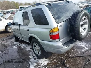 2001 Honda Passport LX z VIN 4S6CK58W014401073, wystawiony jako IAAI lot #41380551 z przebiegiem 259 878 mil mil oraz . Historia ofert i sprzedaży dostępna na DreamBid. Obrazek 3.