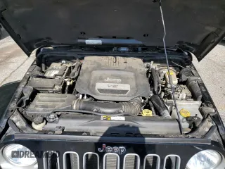 2016 Jeep Wrangler Unlimited Sahara z VIN 1C4BJWEG3GL115814, wystawiony jako Copart lot #62281895 z przebiegiem 75 039 mil mil oraz Szkoda całkowita • Salvage title. Historia ofert i sprzedaży dostępna na DreamBid. Obrazek 12.