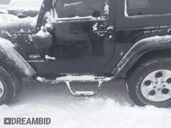 2014 Jeep Wrangler Sahara with VIN 1C4AJWBG3EL190302, listed as a IAAI auction lot 41299284 with 112,476 mi miles and . Bid and sale history available at DreamBid. Image 15.