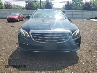 2017 Mercedes-Benz E 300 Luxury with VIN WDDZF4KBXHA185598, listed as a Copart auction lot 61011935 with 59,116 mi miles and Salvage title. Bid and sale history available at DreamBid. Image 5.