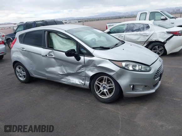 2018 Ford Fiesta SE with VIN 3FADP4EJ0JM104756, listed as a IAAI auction lot 41679507 with 80,553 mi miles. Bid and sale history available at carsss.com. Image 1.