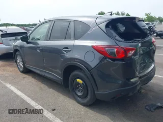 2016 Mazda CX-5 Touring z VIN JM3KE4CY4G0692655, wystawiony jako IAAI lot #42318657 z przebiegiem 212 826 mil mil oraz . Historia ofert i sprzedaży dostępna na DreamBid. Obrazek 3.