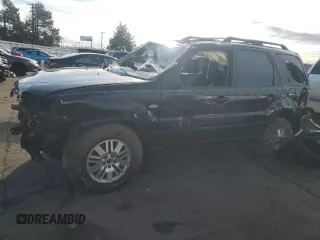 2005 Mercury Mariner Luxury z VIN 4M2CU57185DJ15517, wystawiony jako Copart lot #44415385 z przebiegiem 129 177 mil mil oraz Szkody całkowita. Historia ofert i sprzedaży dostępna na DreamBid. Obrazek 1.
