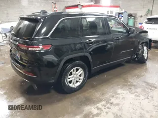2023 Jeep Grand Cherokee Altitude with VIN 1C4RJHAG8P8709690, listed as a IAAI auction lot 41408724 with 32,972 mi miles and . Bid and sale history available at DreamBid. Image 4.