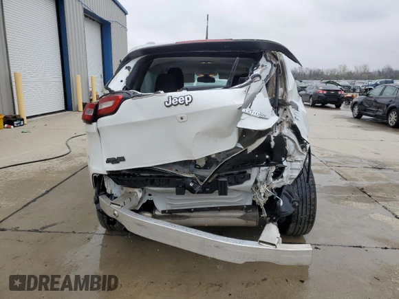 2015 Jeep Cherokee Latitude with VIN 1C4PJLCB9FW532301, listed as a Copart auction lot 52379335 with 153,845 mi miles and Salvage Title. Bid and sale history available at DreamBid. Image 6.
