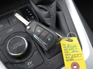 2021 Toyota RAV4 Hybrid LE with VIN 2T3LWRFVXMW118867, listed as a IAAI auction lot 41879735 with 62,978 mi miles. Bid and sale history available at carsss.com. Image 11.