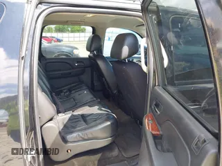 2010 Chevrolet Suburban LT z VIN 1GNUCJE08AR192831, wystawiony jako IAAI lot #42534754 z przebiegiem 165 741 mil mil oraz . Historia ofert i sprzedaży dostępna na DreamBid. Obrazek 8.