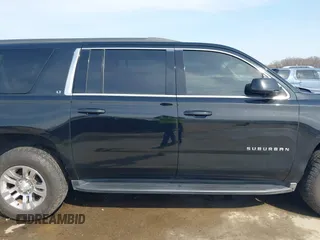 2018 Chevrolet Suburban LT with VIN 1GNSCHKC3JR237396, listed as a IAAI auction lot 41774171 with 205,970 mi miles and . Bid and sale history available at DreamBid. Image 13.