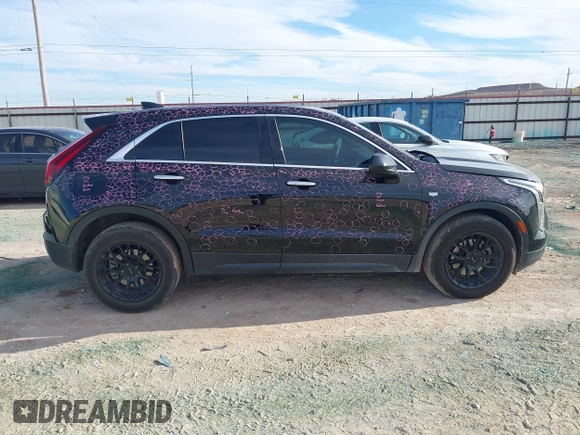 2020 Cadillac XT4 FWD Luxury z VIN 1GYAZAR48LF151119, wystawiony jako IAAI lot #41327430 z przebiegiem 62 704 mil mil oraz . Historia ofert i sprzedaży dostępna na DreamBid. Obrazek 13.