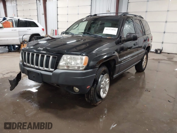 2004 Jeep Grand Cherokee Laredo with VIN 1J4GW48N84C367215, listed as a IAAI auction lot 41352098 with 165,485 mi miles and . Bid and sale history available at DreamBid. Image 17.