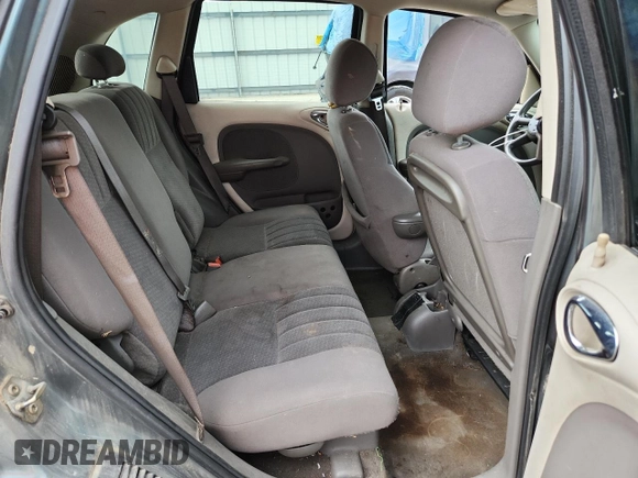 2003 Chrysler PT Cruiser with VIN 3C4FY48B23T556527, listed as a Copart auction lot 60886505 with 128,256 mi miles and Salvage title. Bid and sale history available at DreamBid. Image 10.