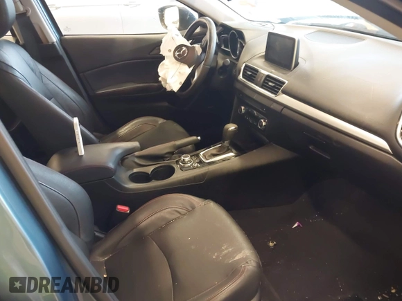 2014 Mazda 3 S Grand Touring with VIN JM1BM1W31E1182703, listed as a IAAI auction lot 41470742 with 123,956 mi miles and . Bid and sale history available at DreamBid. Image 5.
