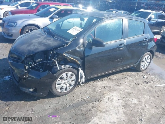 2012 Toyota Yaris L with VIN JTDKTUD33CD504907, listed as a IAAI auction lot 41587510 with 242,307 mi miles. Bid and sale history available at carsss.com. Image 2.