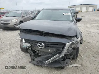 2016 Mazda CX-9 Sport с VIN JM3TCBBY0G0102189, выставлен на аукционе Copart как лот 51472475 с пробегом 68 052 миль миль и Списание • Salvage title. История ставок и продаж доступна на DreamBid. Изображение 5.