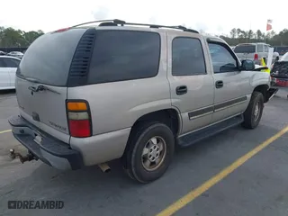 2004 Chevrolet Tahoe LT with VIN 1GNEC13Z34J258811, listed as a IAAI auction lot 41710156 with 322,462 mi miles. Bid and sale history available at carsss.com. Image 4.