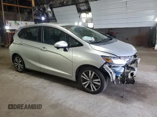 2015 Honda Fit EX-L with VIN 3HGGK5H86FM754172, listed as a Copart auction lot 60870975 with 74,377 mi miles and Salvage title. Bid and sale history available at DreamBid. Image 4.