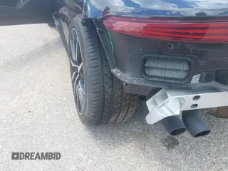 2020 Aston Martin Vantage z VIN SCFSMGAW4LGN03097, wystawiony jako IAAI lot #42227516 z przebiegiem Nie podano mil oraz . Historia ofert i sprzedaży dostępna na DreamBid. Obrazek 19.