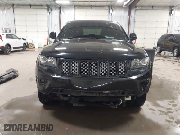 2015 Jeep Grand Cherokee Laredo with VIN 1C4RJFAG3FC115444, listed as a IAAI auction lot 41248211 with 138,828 mi miles. Bid and sale history available at carsss.com. Image 13.