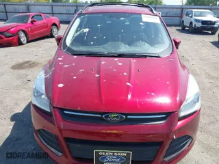 2015 Ford Escape SE with VIN 1FMCU0GXXFUA57386, listed as a IAAI auction lot 42043058 with 107,635 mi miles. Bid and sale history available at carsss.com. Image 6.